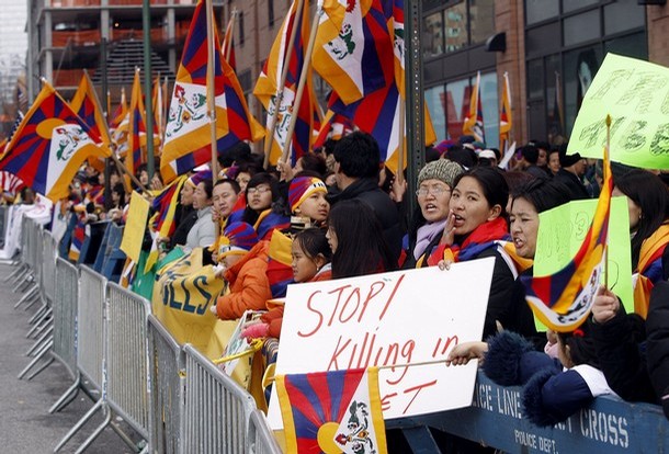 People hold a rally in support of Tibet outside the Chinese consulate, in New York