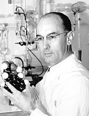 (FILES) This undated handout file picture released by Novartis laboratories shows scientist Dr Albert Hofmann showing a model of the LSD molecule. Swiss authorities said on April 30, 2008 that Hofmann, the Swiss chemist who discovered the now-banned hallucinogenic drug LSD that was an icon of the Hippy movement, has died at the age of 102. AFP PHOTO/FILES/NOVARTIS/HO